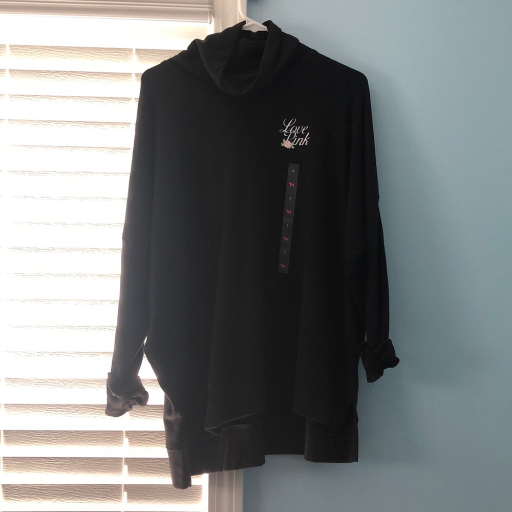 Black sweater from pink